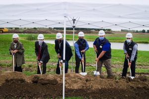 Pictured L-R: Delaware County Commissioner Sherry Riggin, Muncie Mayor Dan Ridenour, Gov. Eric Holcomb, CANPACK representatives Tom Johnson, Dusty Jordan, Josh Ballard.