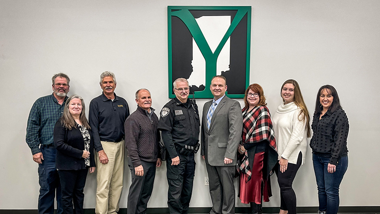 Pictured (from left): Yorktown Town Council members Dan Flanagan, Nanci Sears Perry, Lon Fox, and Rich Lee; interim Police Chief Larry Harless; new Town Marshal Shane Ginnan and his wife and daughter, Kimberly and Gillian; Yorktown Town Council member Marta Guinn. Photo provided.